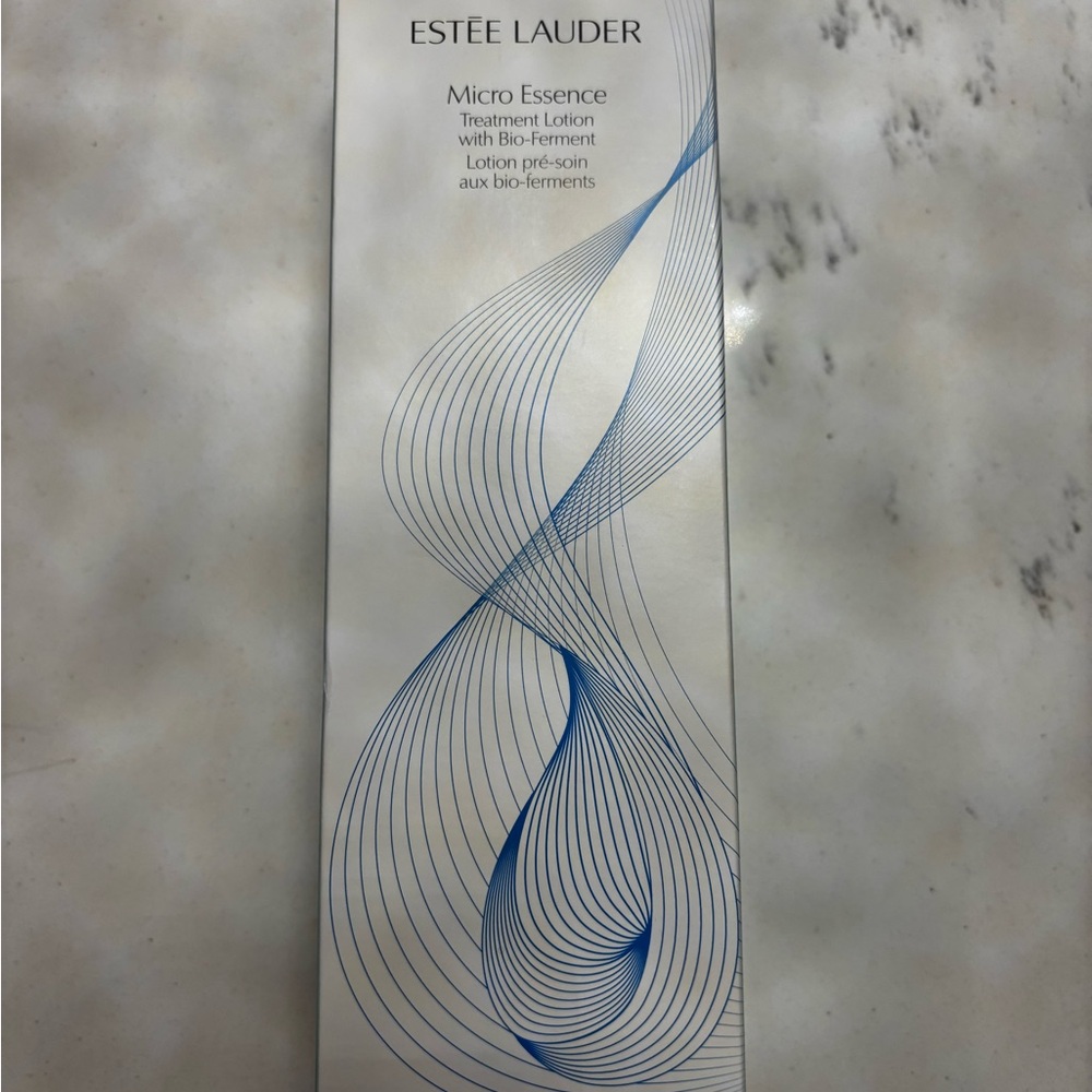 Estee Lauder Micro Essence Treatment Lotion - Blue on White